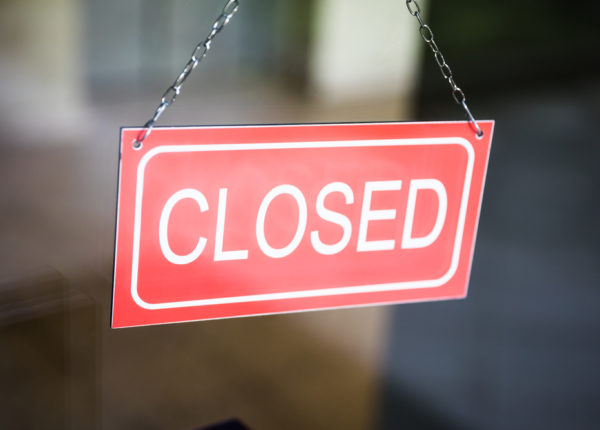 Close-up Of Closed Tag Inside The Window Shop